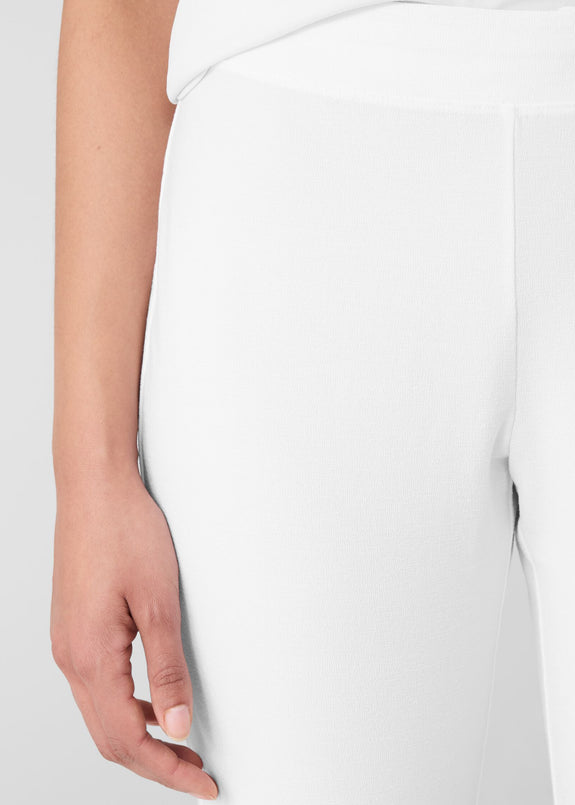 close up front view of Eileen Fisher stretch crepe slim leg pull on plus size pant in white