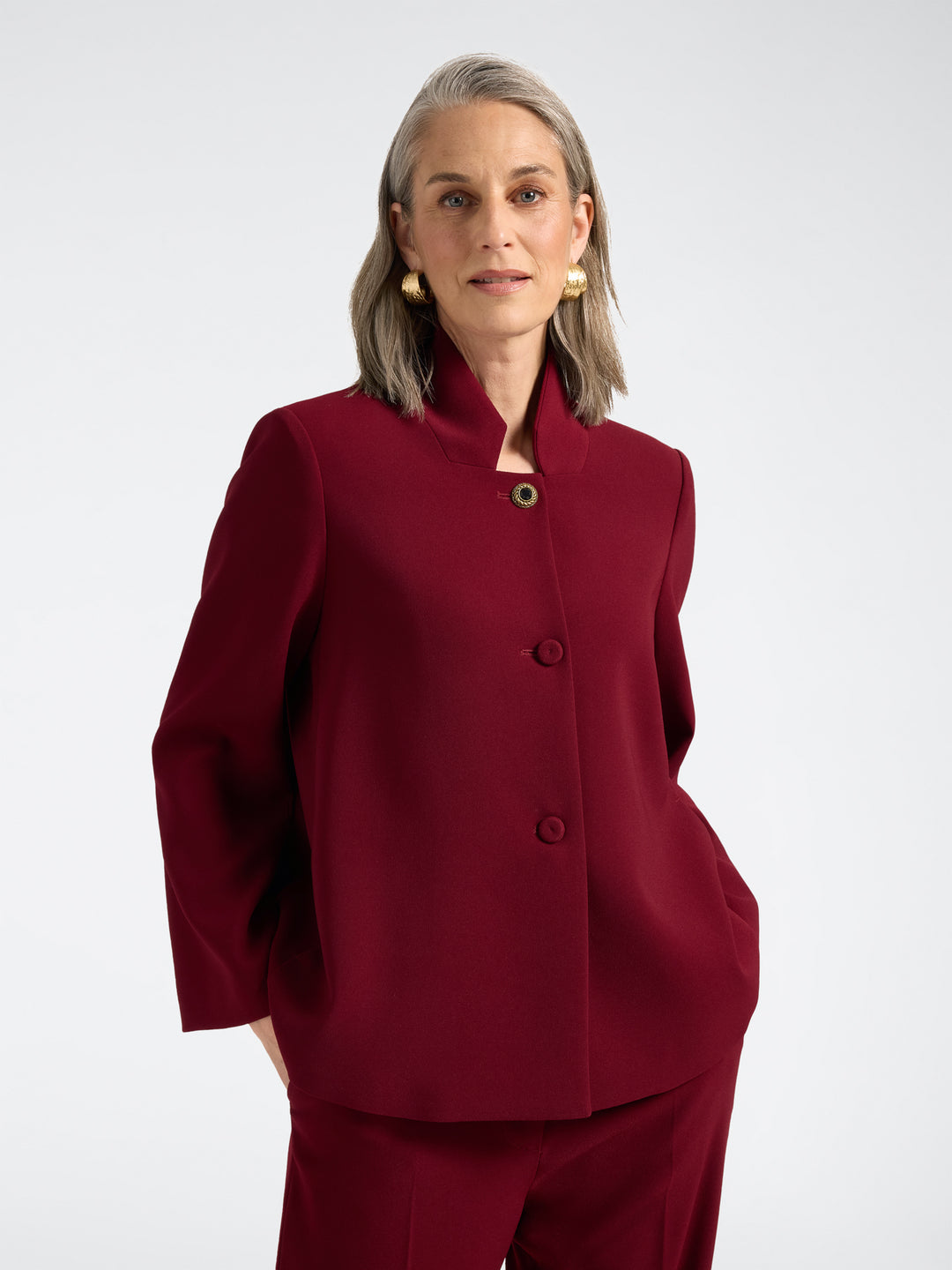 Red stand-collar three-button jacket with side pockets