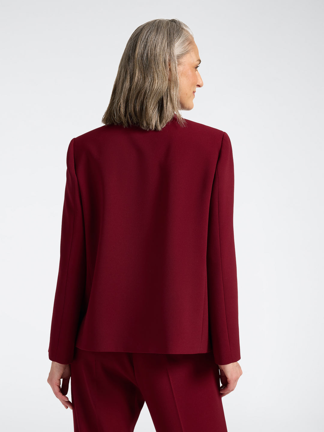 Red stand-collar jacket back view with 3/4 sleeves