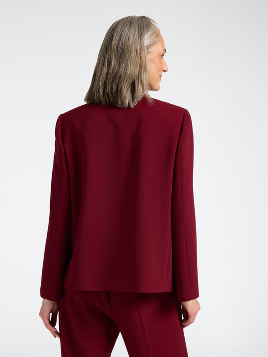 Red stand-collar jacket back view with 3/4 sleeves