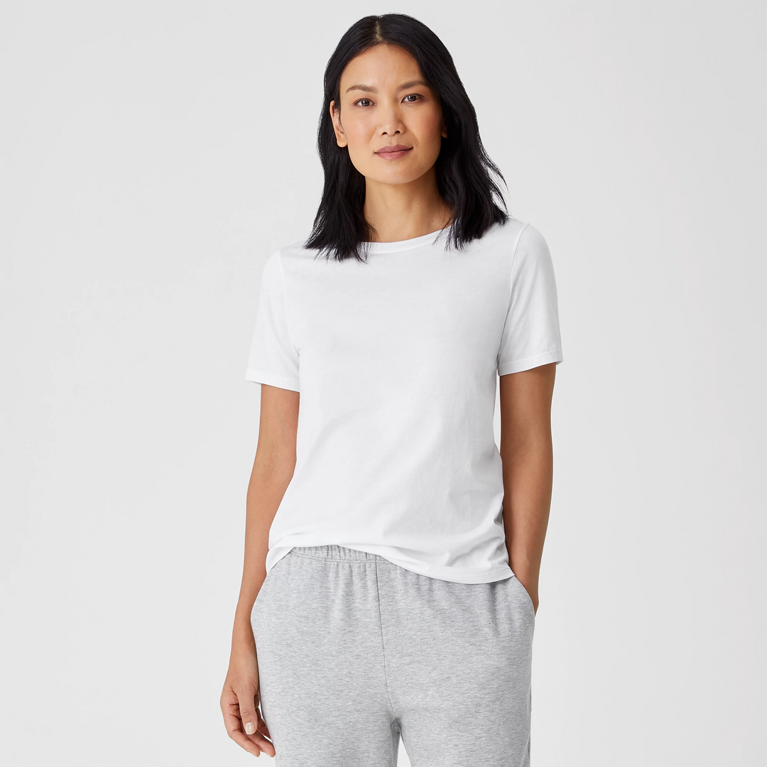 White short sleeve crew neck t-shirt on model, front view