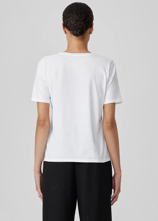 Women's white crew-neck short-sleeve tee with straight back hem
