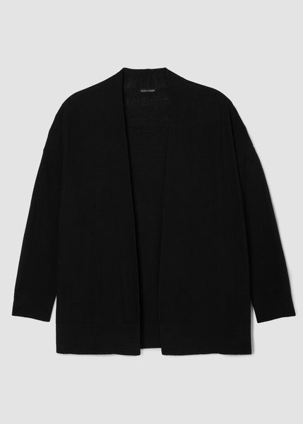 Eileen Fisher Black blazer on a light gray background