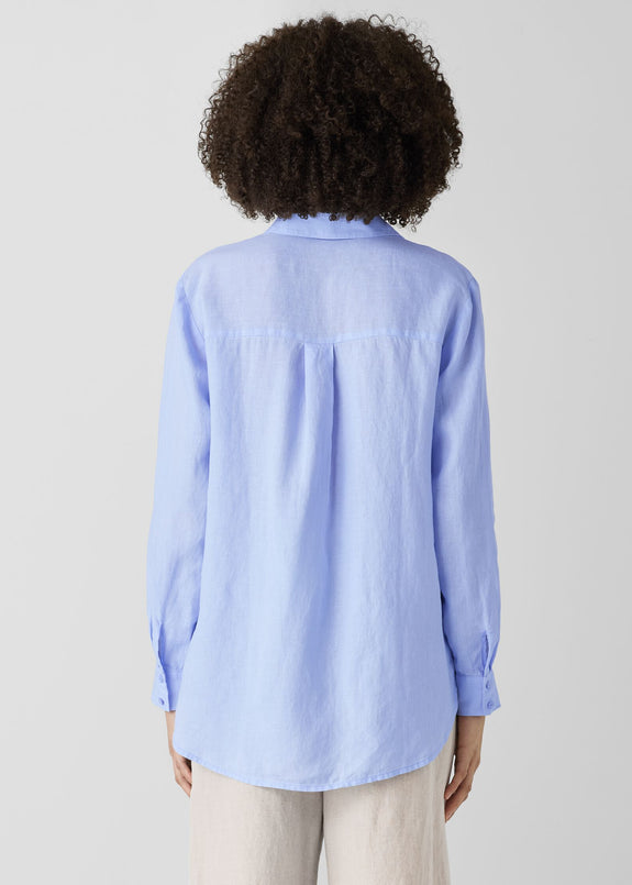 back view of Eileen fisher classic collar long sleeve button front organic linen pus size shirt in color bellflower