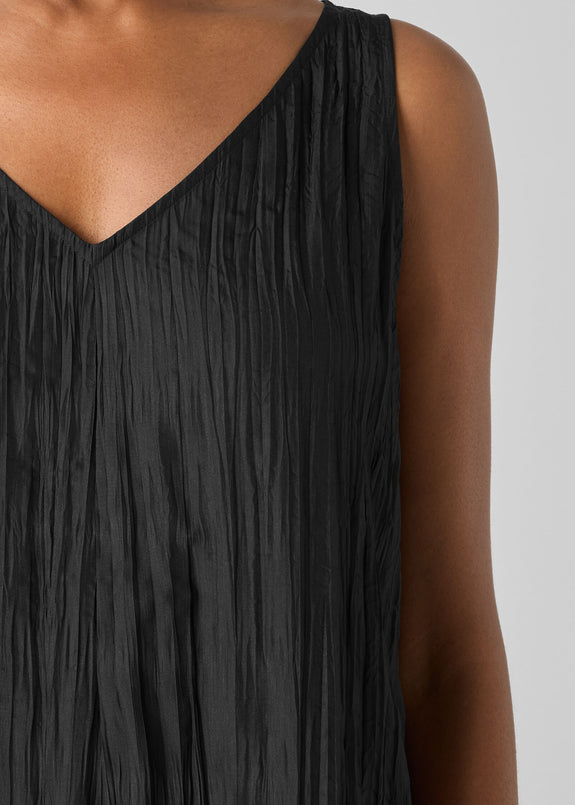 close up front view of plus size Eileen Fisher Crushed Silk V-Neck Pleated Full Length Dress in Black