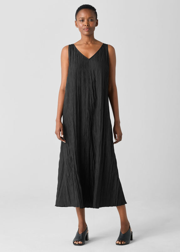 front view of plus size Eileen Fisher Crushed Silk V-Neck Pleated Full Length Dress in Black