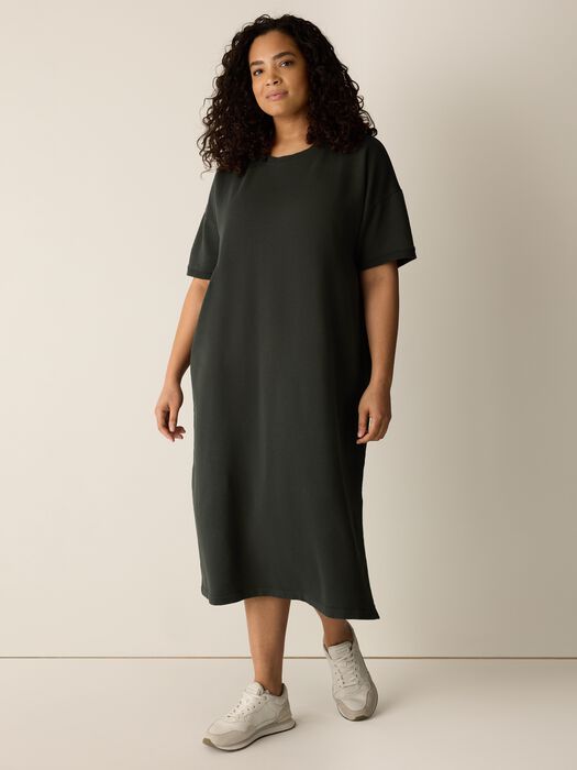 Dark green crew-neck midi dress with elbow sleeves and side slit hem