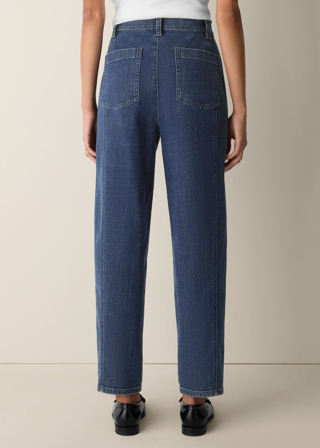 back view of plus size Eileen Fisher Cotton Stretch Denim Ankle Lantern Pant in Medium Indigo