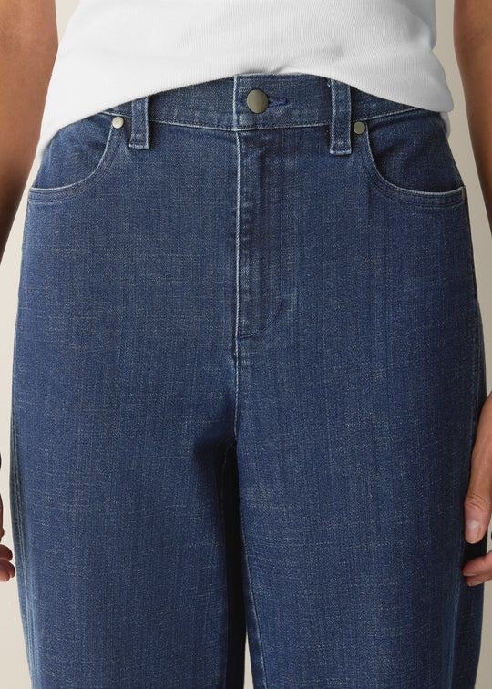 close up front view of plus size Eileen Fisher Cotton Stretch Denim Ankle Lantern Pant in Medium Indigo