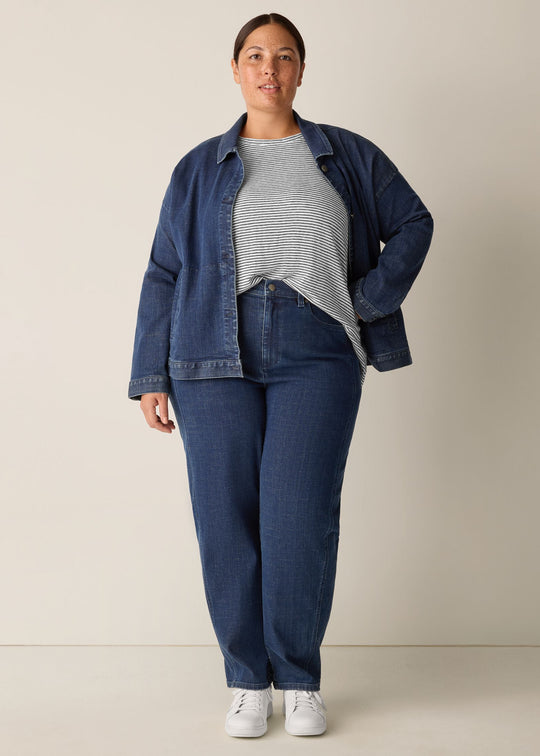 front view of plus size Eileen Fisher Cotton Stretch Denim Ankle Lantern Pant in Medium Indigo on model