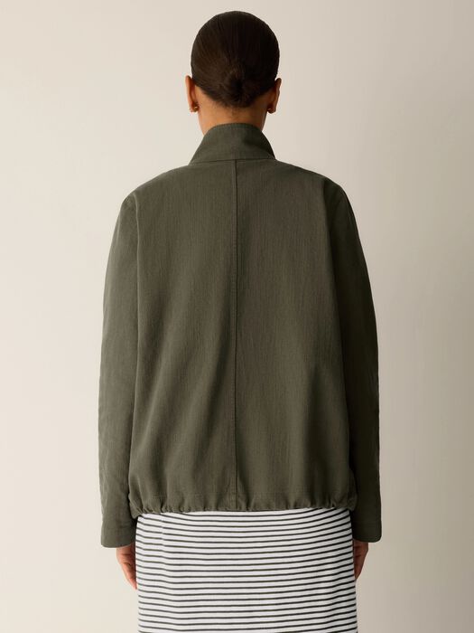 Olive zip-up jacket back view with stand collar and drawstring hem