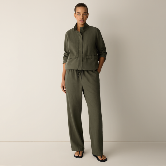 Olive straight-leg pants with elastic waistband and drawstring; relaxed straight fit