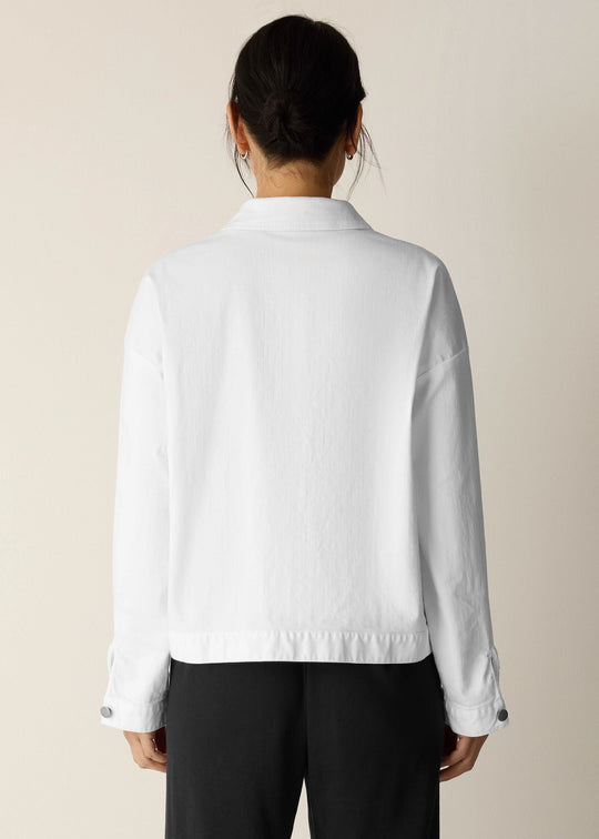 Back view of plus size Eileen Fisher Classic Collar White Denim Jacket in White