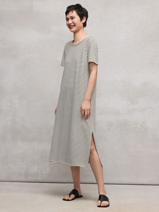 Green-and-white striped midi dress with round neck and short sleeves, easy drape