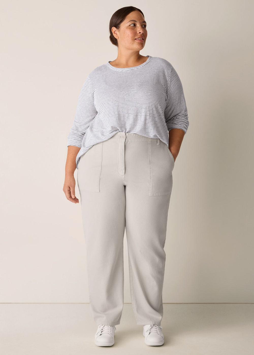 front view of plus size Eileen Fisher Striped Organic Linen Jersey Crew Neck Long Sleeve Tee in Bayleaf Stripe