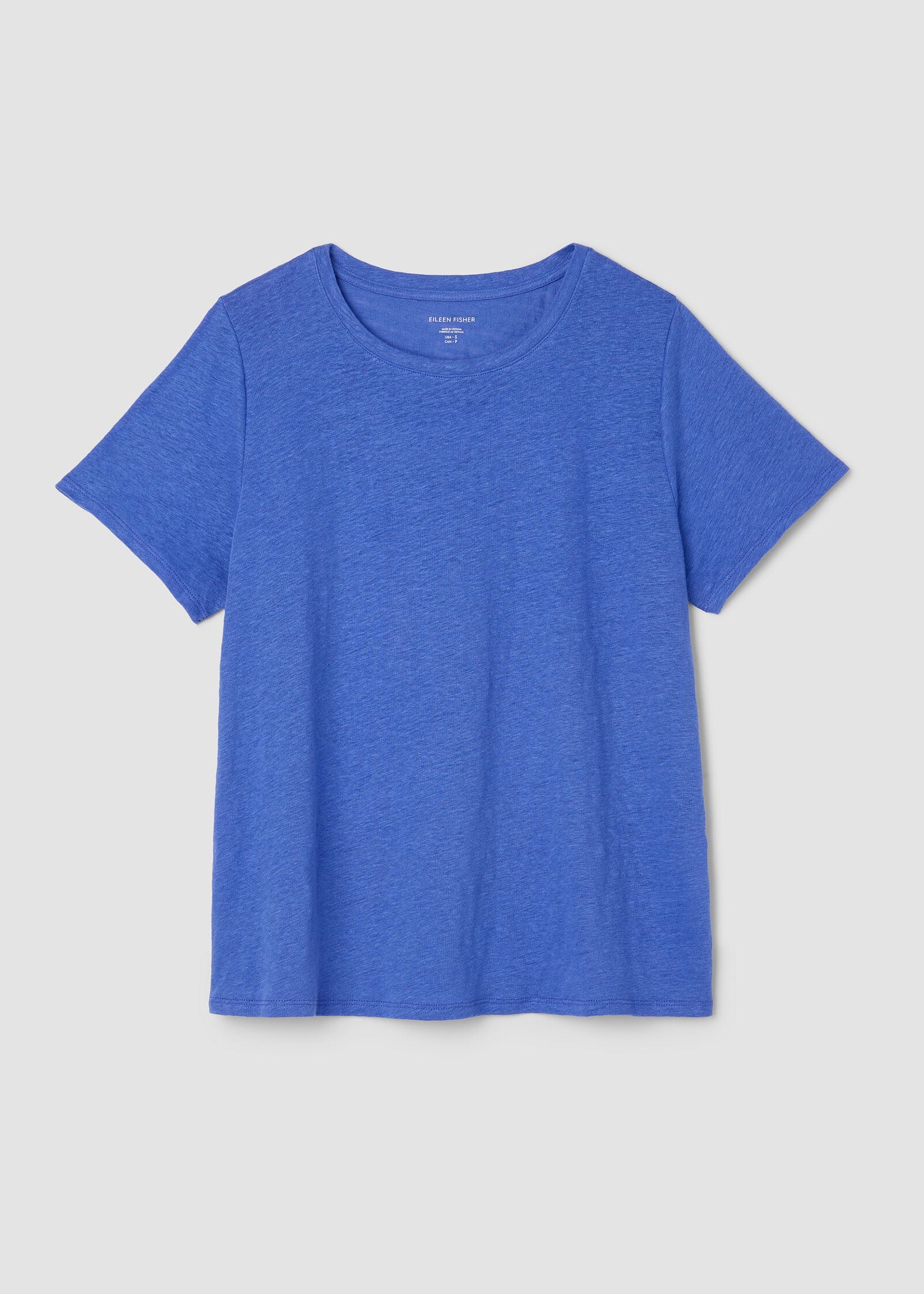 Blue t-shirt on a light gray background