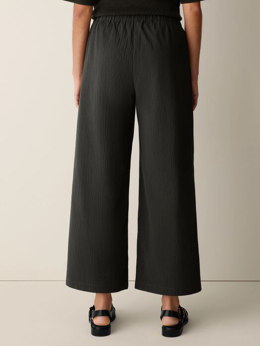 Seaweed green wide-leg ankle pants with pucker texture and elastic waistband