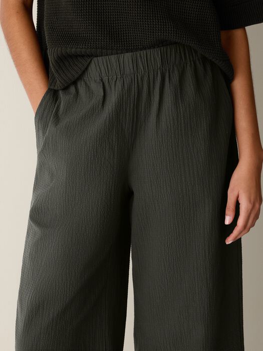 Seaweed green pucker ankle pants with elastic waistband, close-up