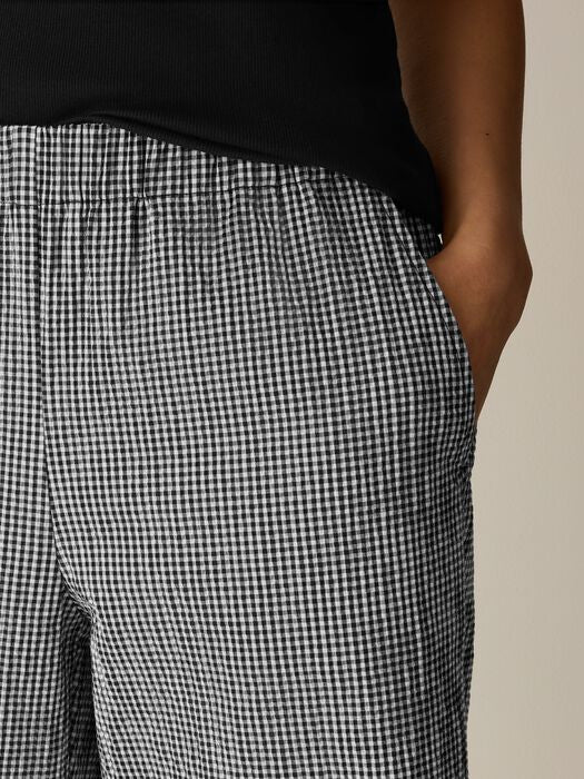 Wide leg ankle pants in black and white gingham check pattern, side view detail