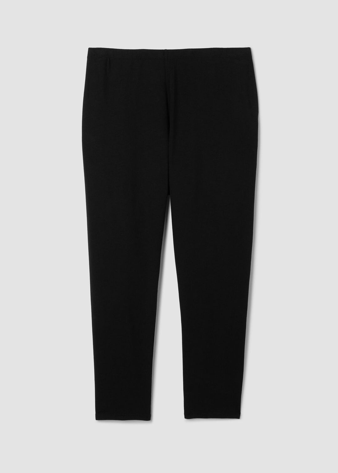 Black leggings on a light gray background