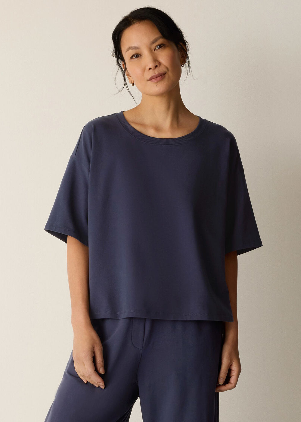 Front view of plus size Eileen Fisher Organic Cotton Stretch Jersey Crew Neck Boxy Tee in Ink