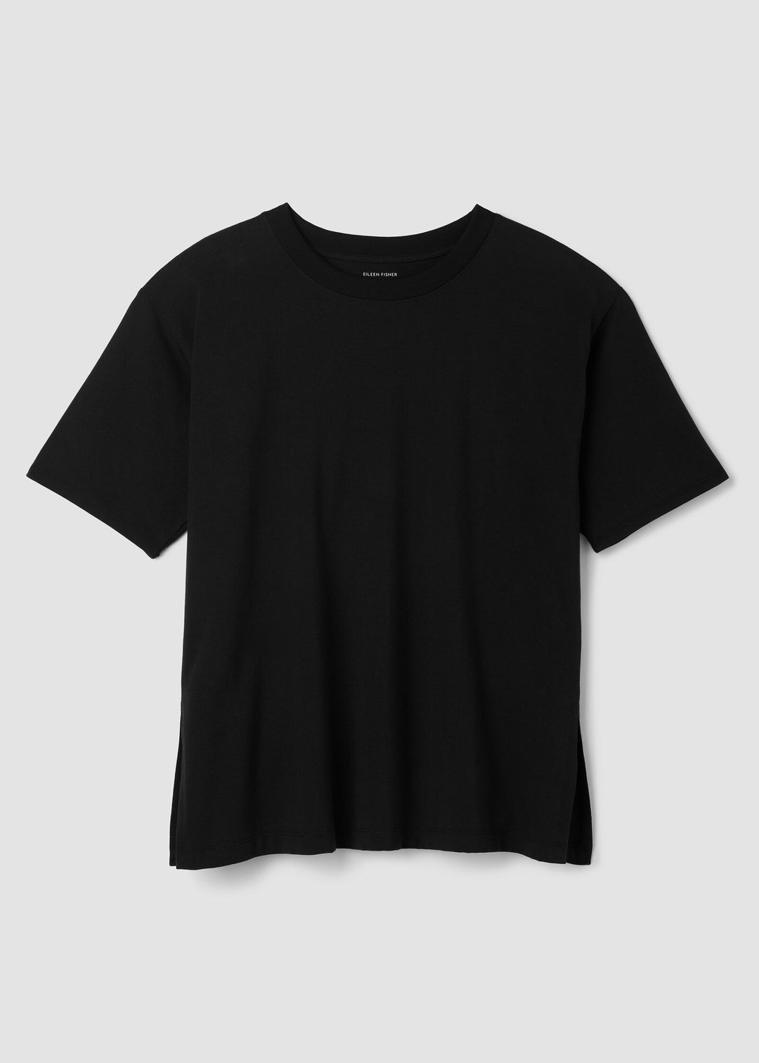 Black t-shirt on a light gray background