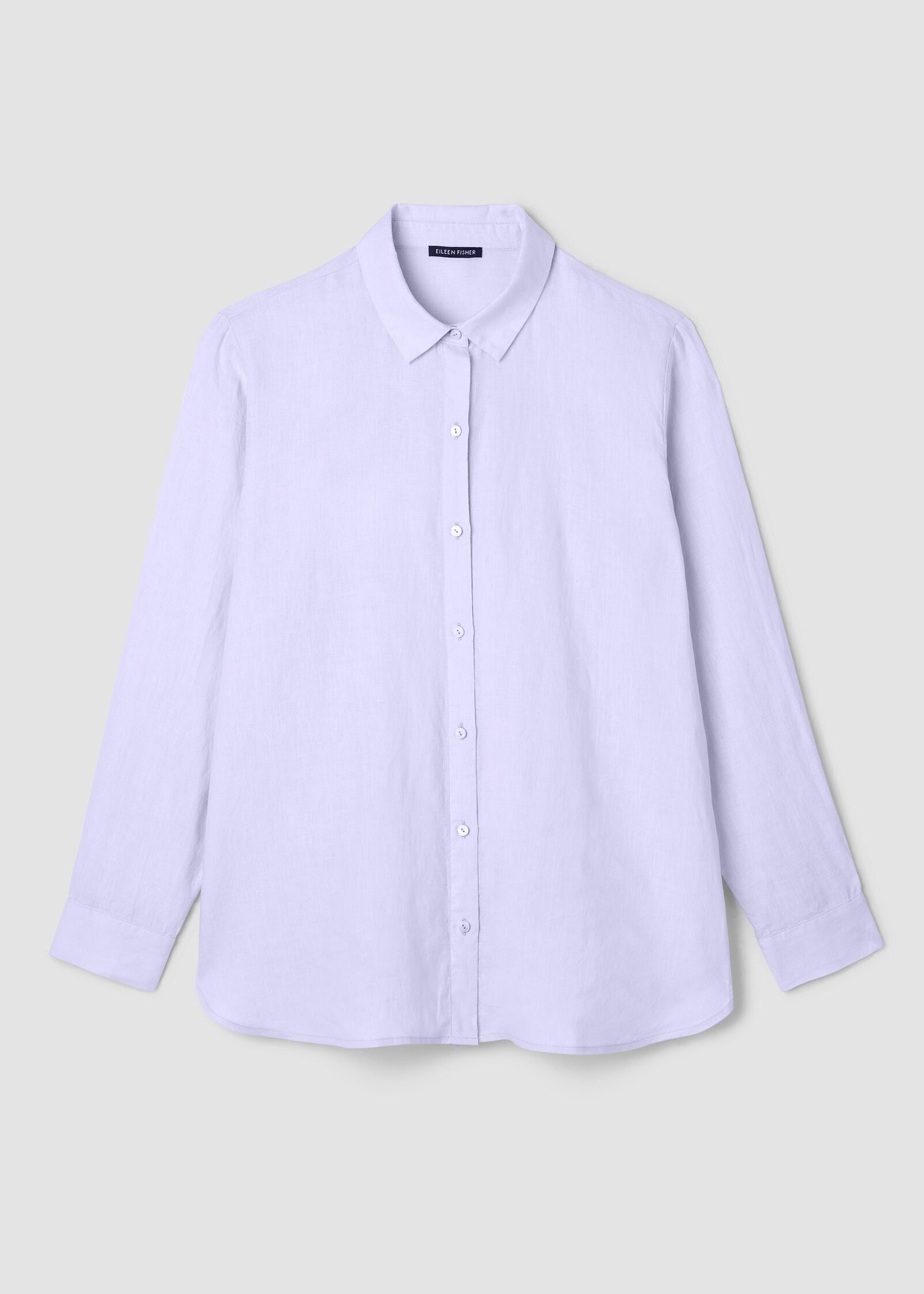 Light purple shirt on a light gray background