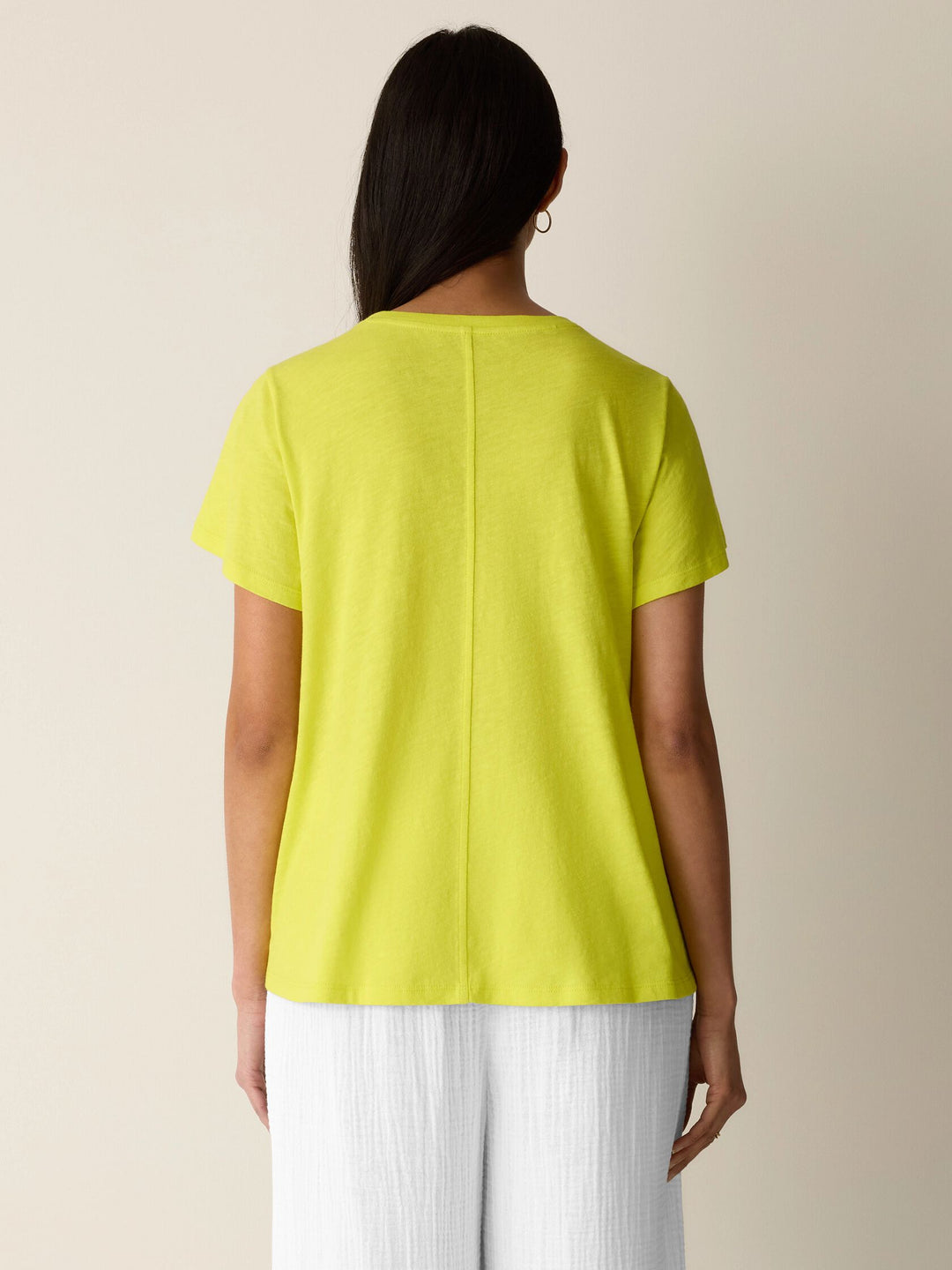 Back view of lemongrass yellow crew-neck cap-sleeve tee in slubby jersey