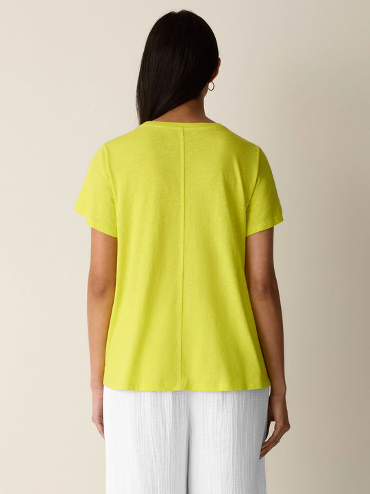 Back view of lemongrass yellow crew-neck cap-sleeve tee in slubby jersey