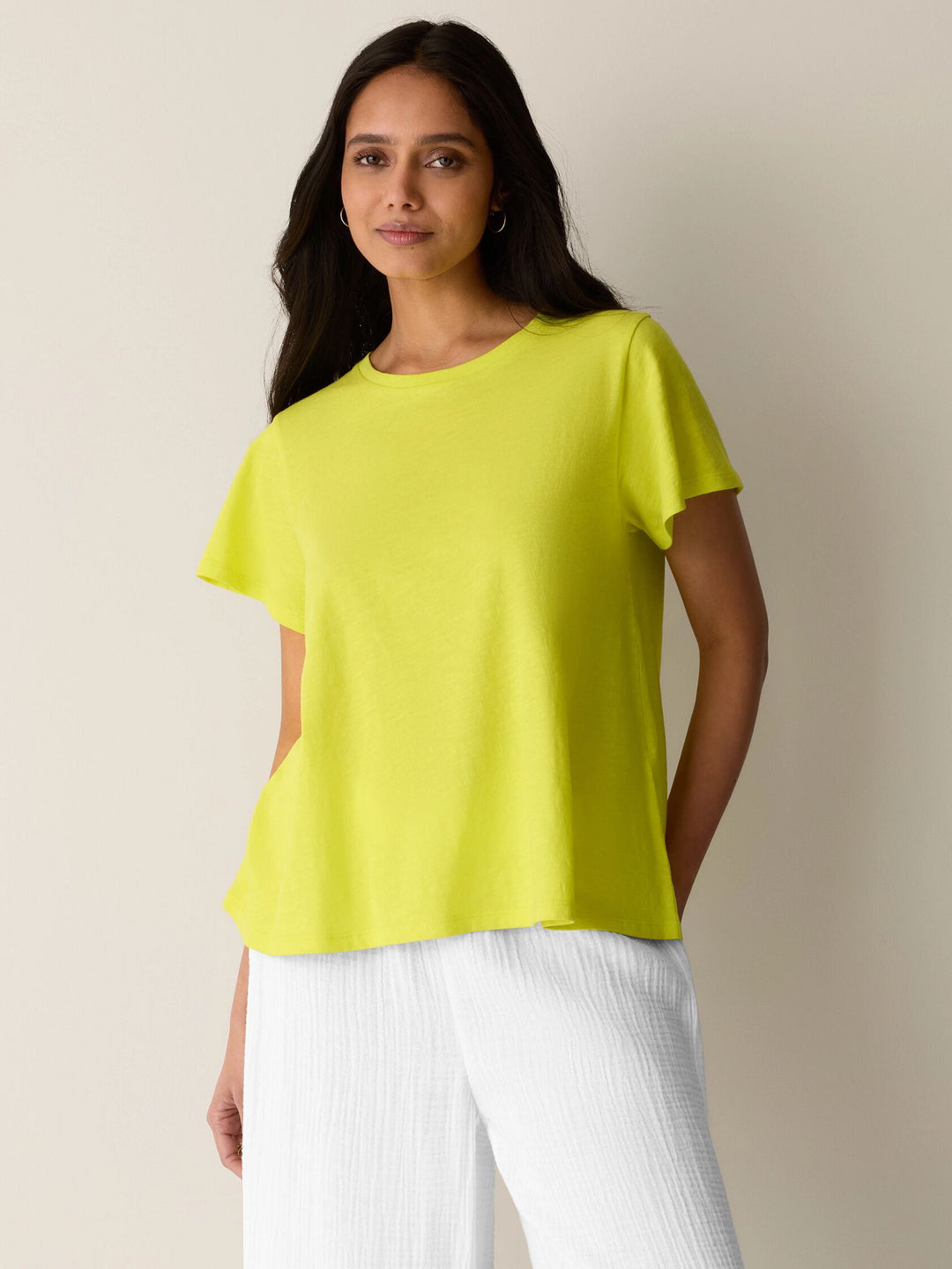 Lemongrass yellow crew-neck cap-sleeve tee with relaxed drape, slubby jersey