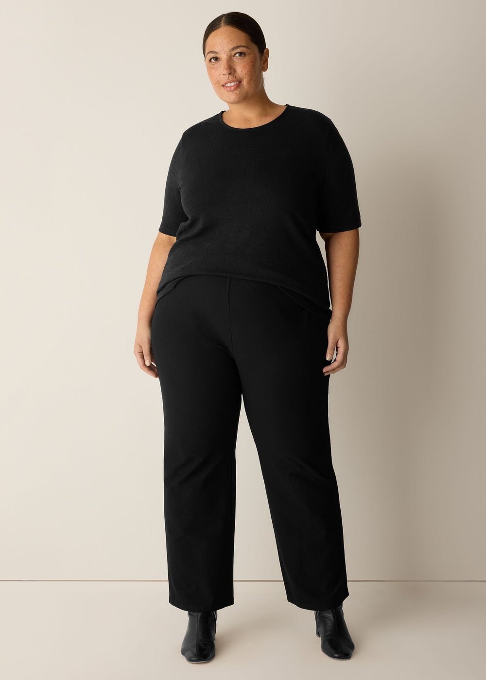 Front view of plus size Eileen Fisher Washable Stretch Crepe Ankle Kick Pant in Black