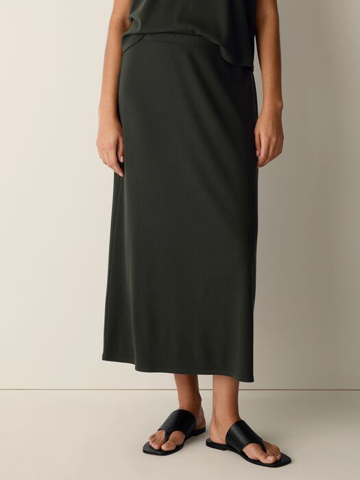 Black ribbed knit full-length skirt with pull-on waistband and straight fit