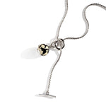 Silver chain necklace with toggle clasp and round animal print charm pendant