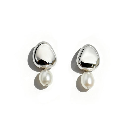 Silver teardrop stud earrings with dangling white pearl drops on clean white background