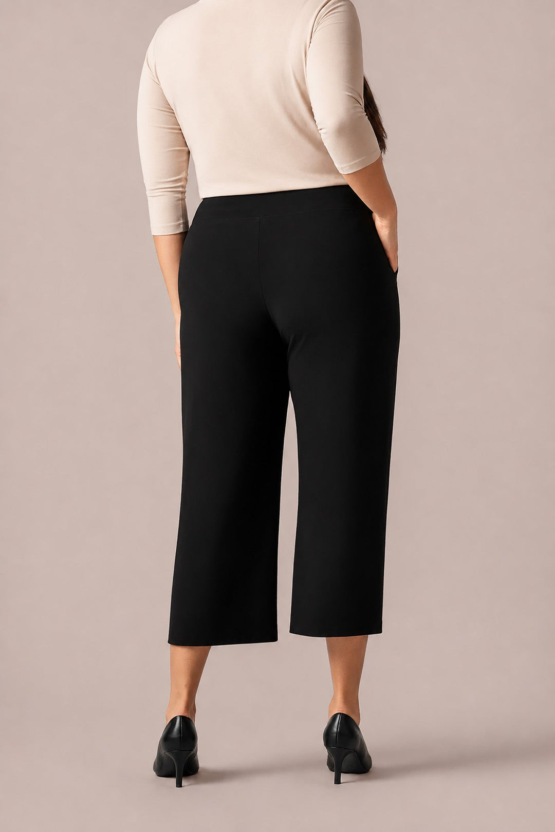 Black wide-leg cropped pants with mid-calf hem and back seam detail