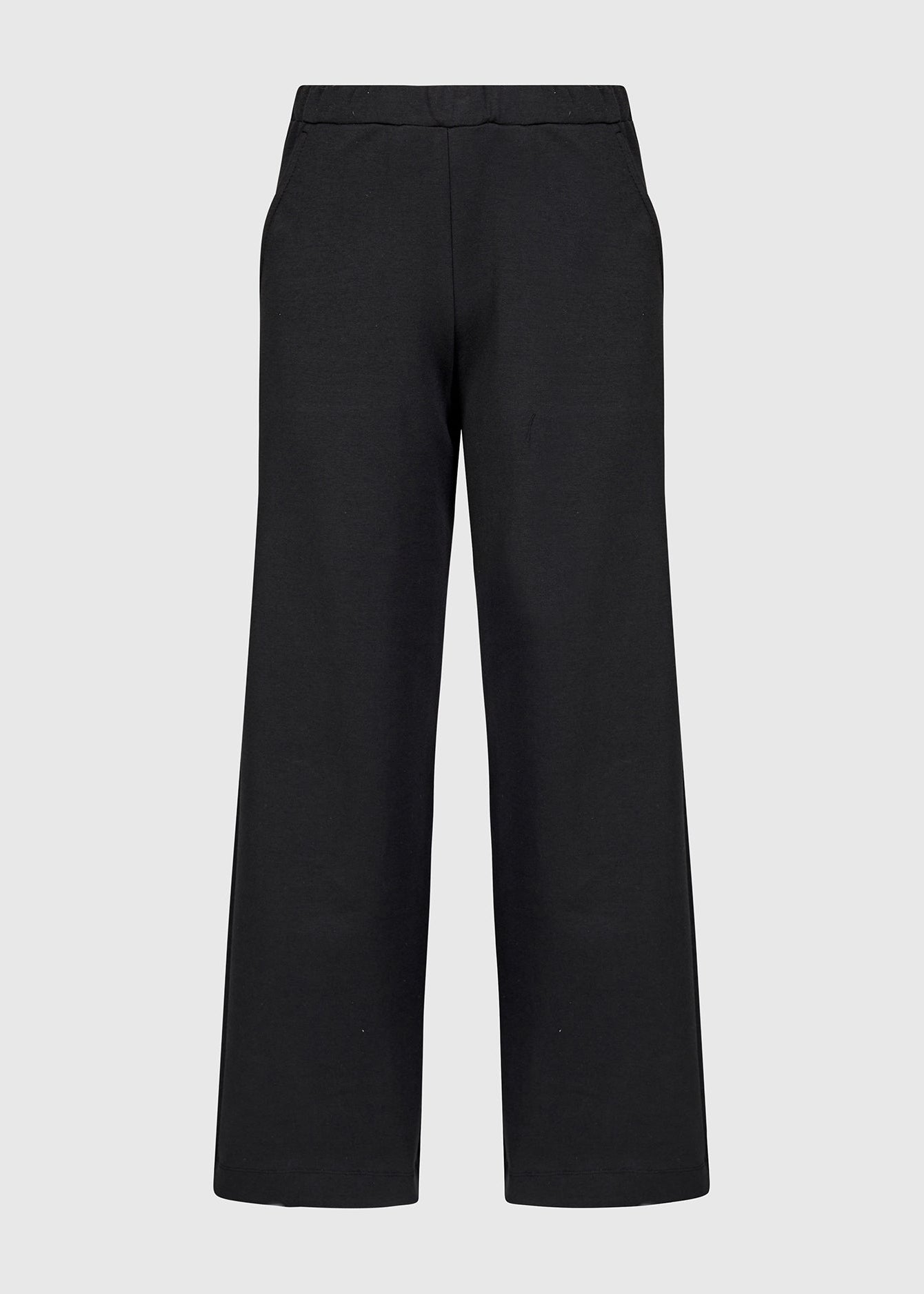 Black pants on a light gray background
