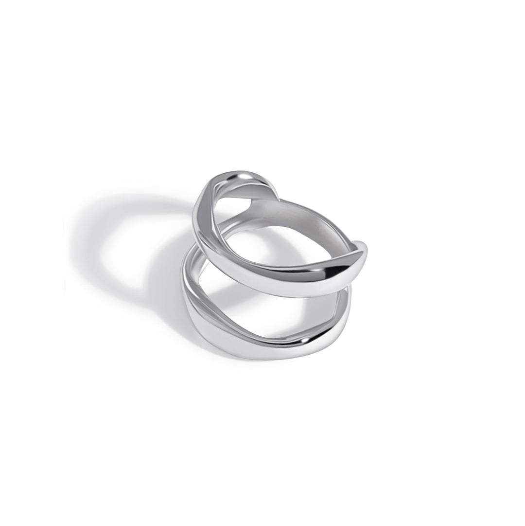 Modern silver ring with curved overlapping bands in sculptural design