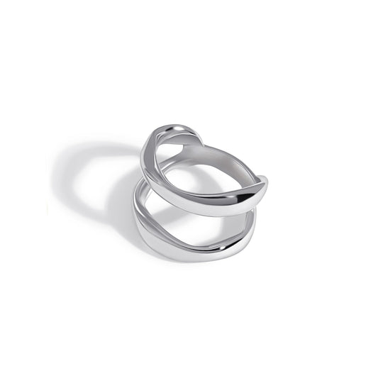Modern silver ring with curved overlapping bands in sculptural design