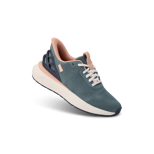 Kizik Athens 2 sneakers, stormy teal upper with perforations, white laces, and light sole