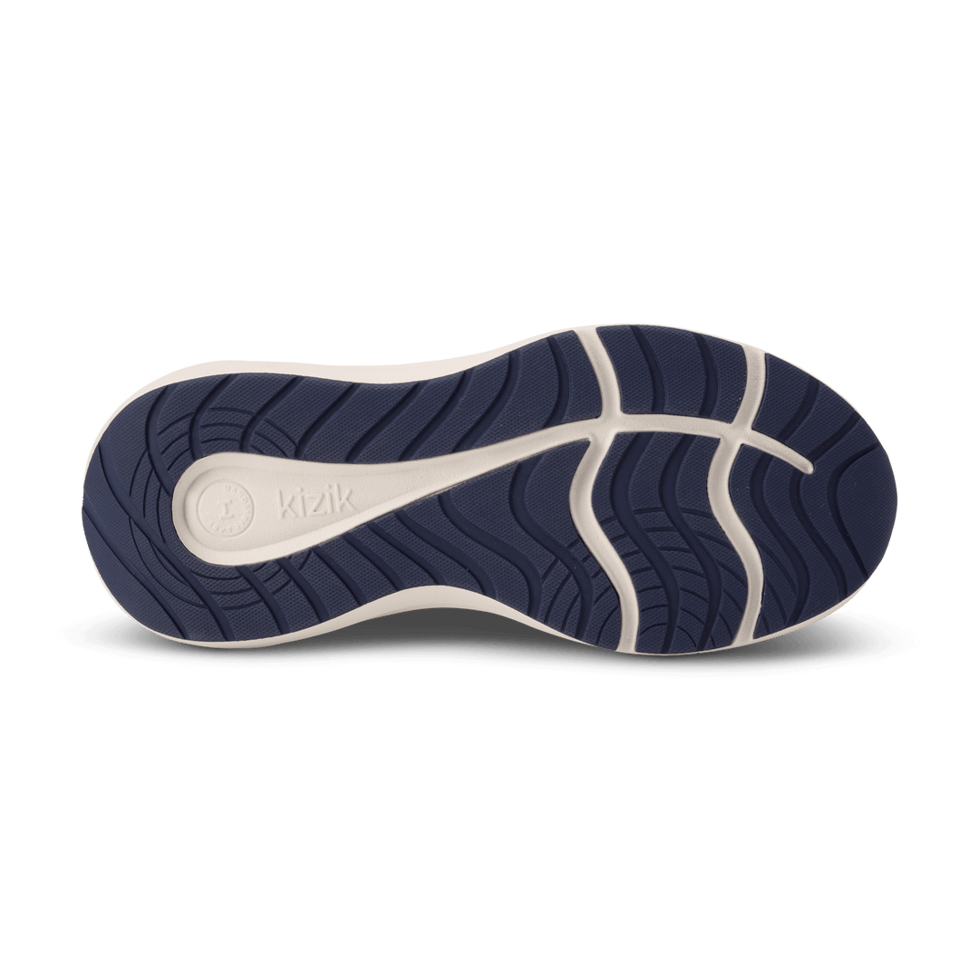 Kizik Athens 2 shoe outsole in navy with traction grooves and white midsole edge