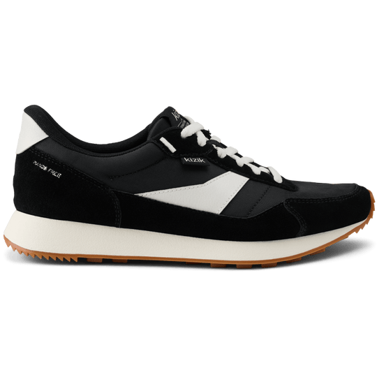 Kizik Siena lace-up sneakers side view, black upper with white panels and gum outsole