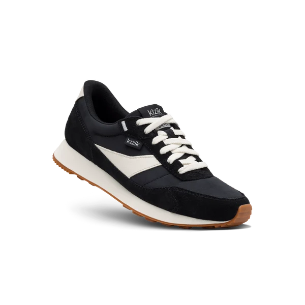 Kizik Siena lace-up sneakers, side view, black suede with white accents and gum sole