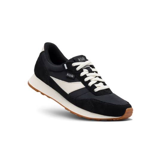 Kizik Siena lace-up sneakers, side view, black suede with white accents and gum sole