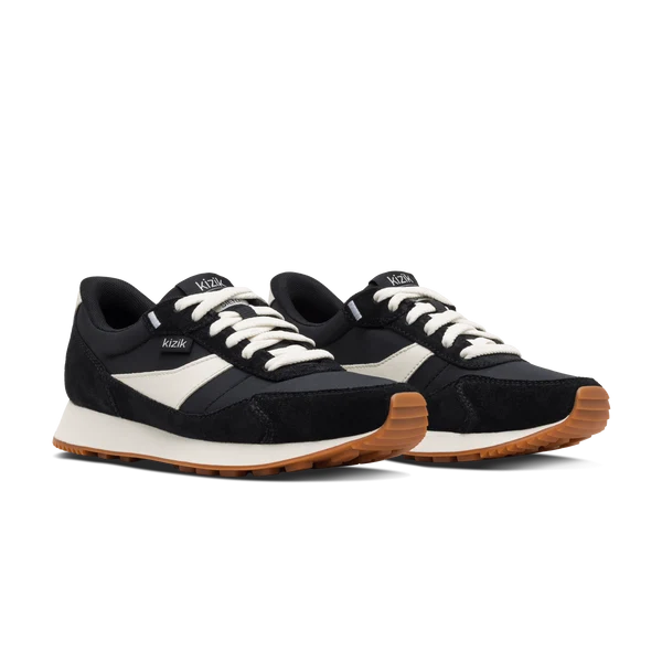 Pair of Kizik Siena sneakers, black and white uppers with gum rubber midsoles