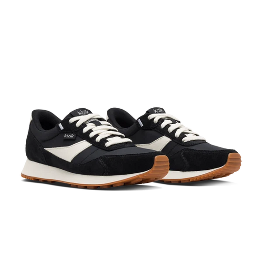 Pair of Kizik Siena sneakers, black and white uppers with gum rubber midsoles