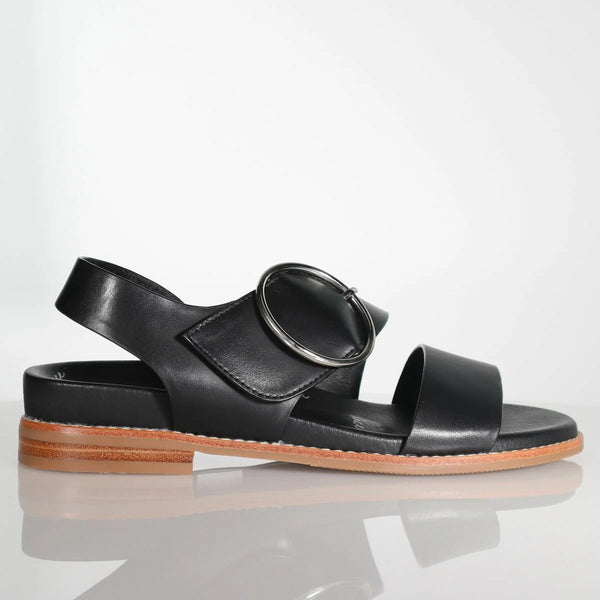 side view of Minx Willa Wellness Leather Sandal with round Buckle in Black