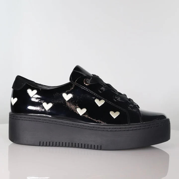 side view of Minx Ace of Hearts Black Patent runner with Ivory Hearts and Ribbon Laces in Black White