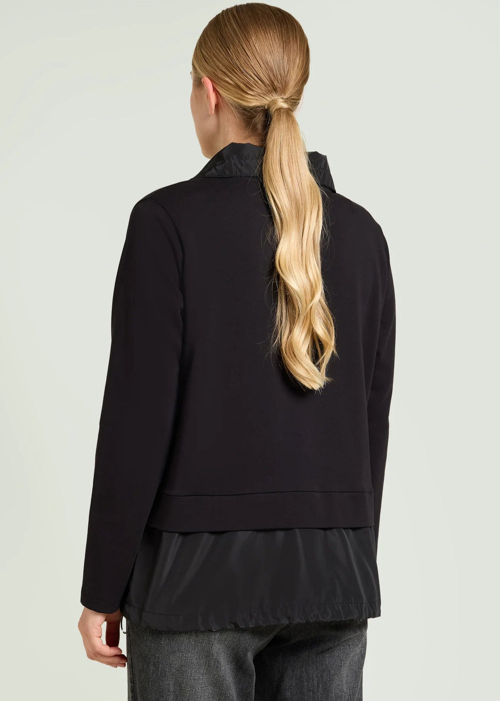 back view of plus size Luisa Viola Zip Front Athleisure jacket with taffeta trim in Black