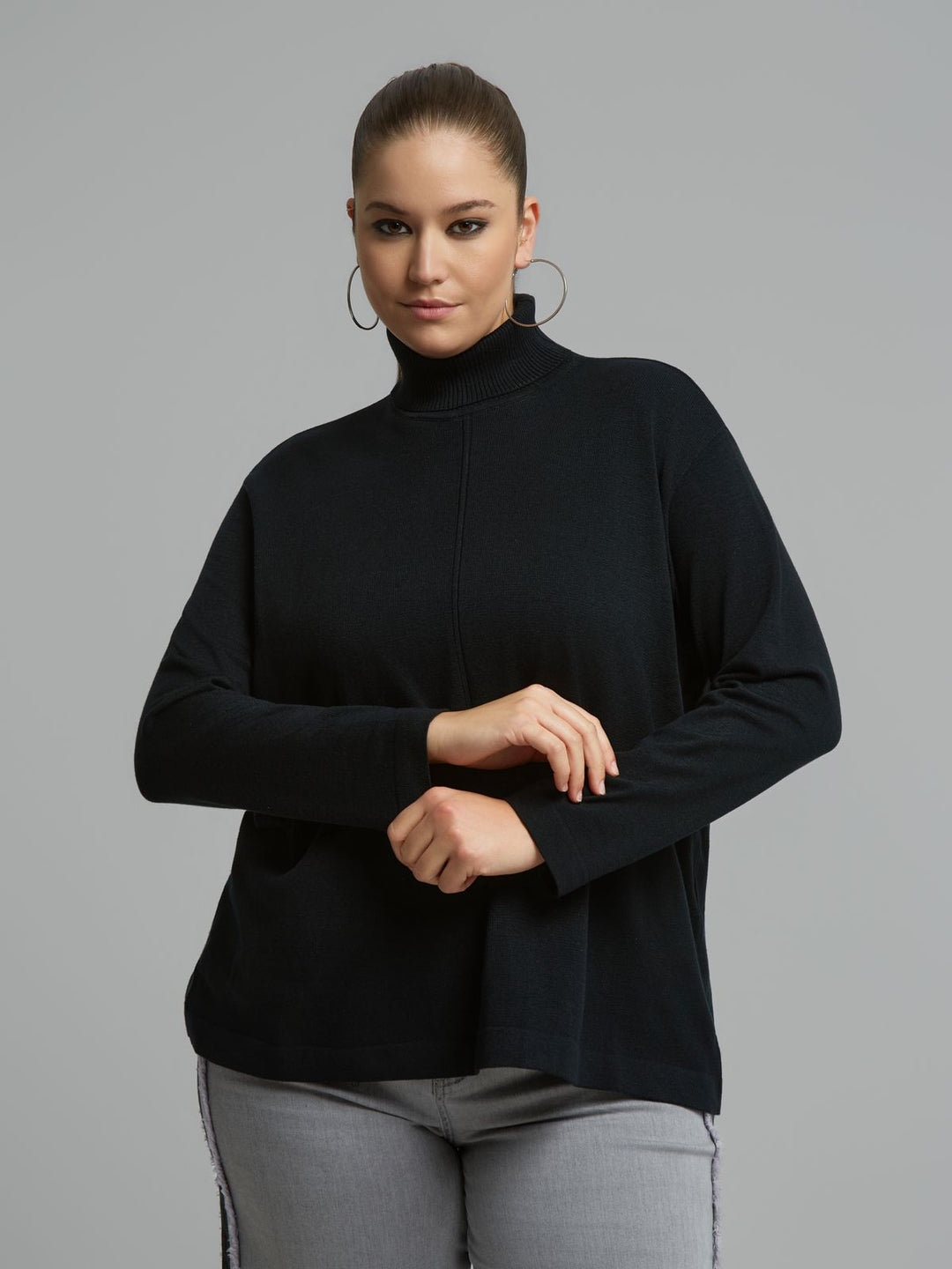 Black long-sleeve turtleneck sweater with front seam and ribbed neck