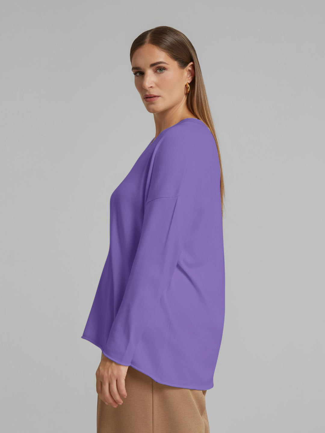 Lilac V-neck sweater, side view with long sleeves and soft drape.